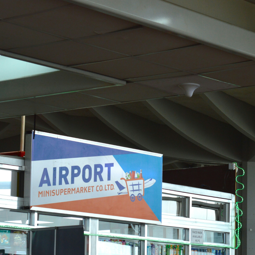 airport store sign on front of store